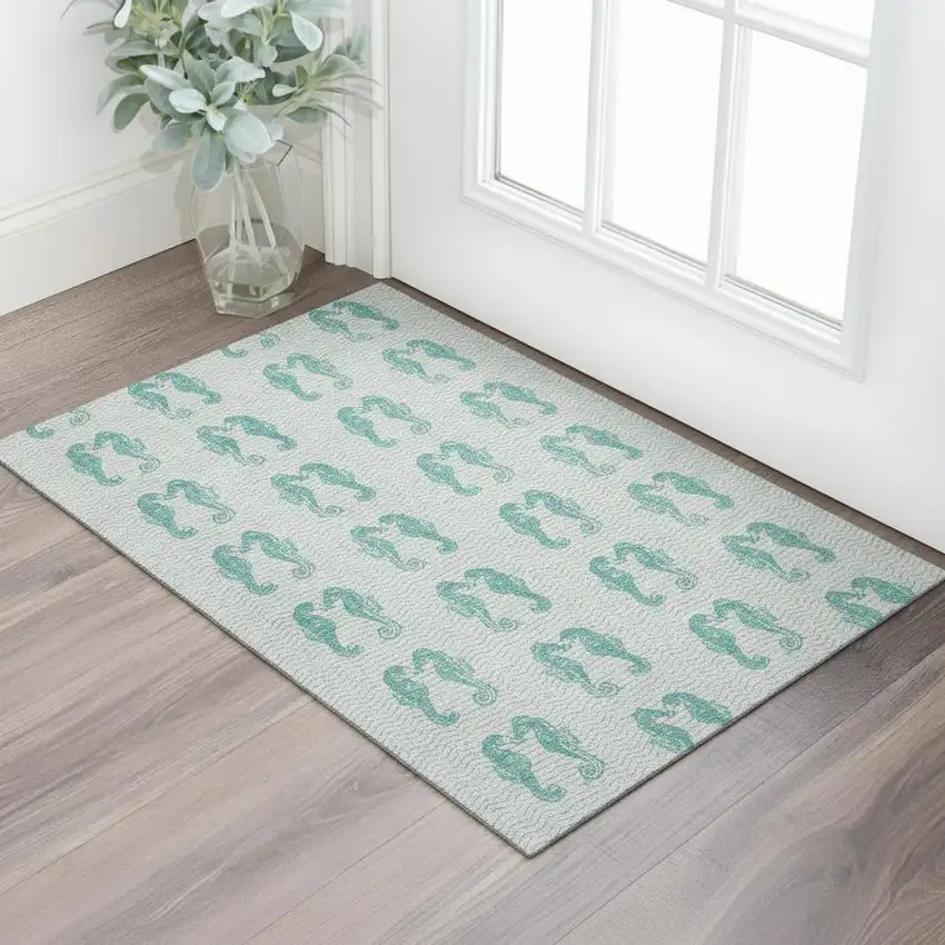 Aqua And Ivory Geometric Washable Area Rug With UV Protection Photo 1