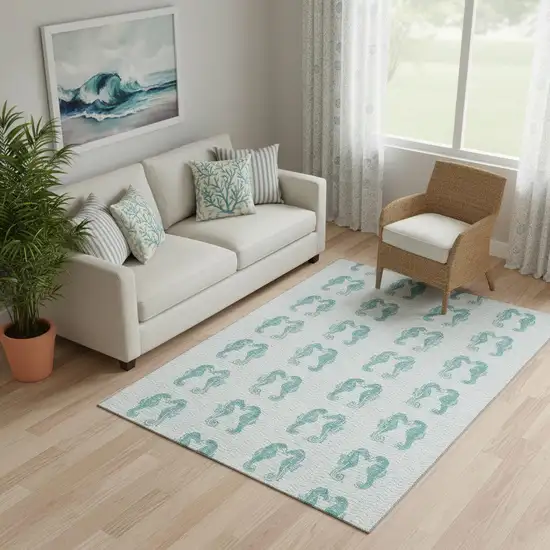 Aqua And Ivory Geometric Washable Area Rug With UV Protection Photo 1
