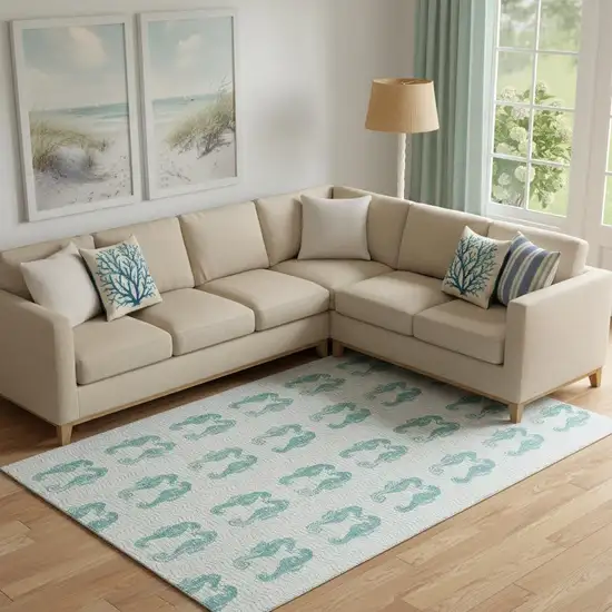 Aqua And Ivory Geometric Washable Area Rug With UV Protection Photo 1