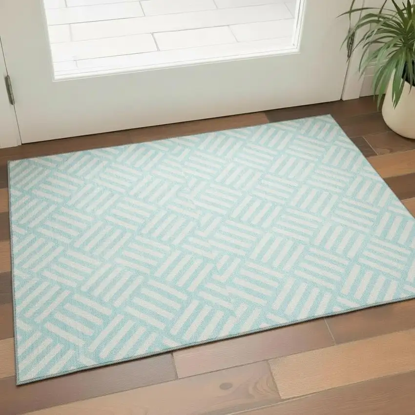 Aqua And Ivory Geometric Washable Area Rug With UV Protection Photo 1