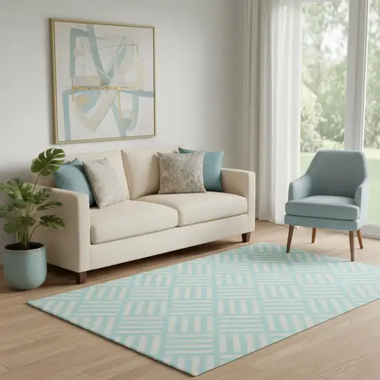 Aqua And Ivory Geometric Washable Area Rug With UV Protection Photo 1
