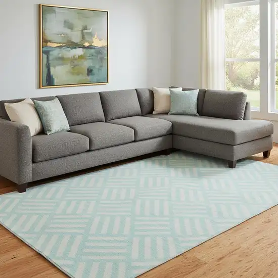 Aqua And Ivory Geometric Washable Area Rug With UV Protection Photo 1