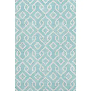 Photo of Aqua And Ivory Geometric Washable Area Rug With UV Protection