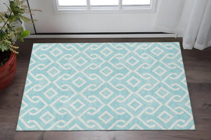 Aqua And Ivory Geometric Washable Area Rug With UV Protection Photo 2
