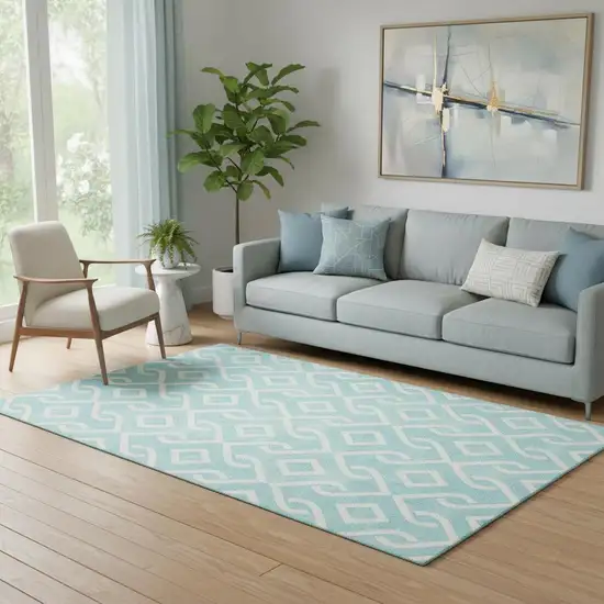 Aqua And Ivory Geometric Washable Area Rug With UV Protection Photo 1
