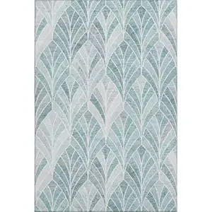 Photo of Aqua And Ivory Geometric Washable Area Rug With UV Protection