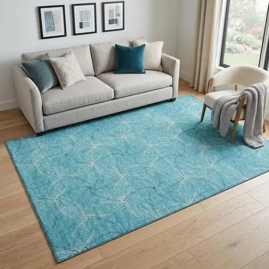 Aqua And Ivory Geometric Washable Area Rug With UV Protection Photo 1