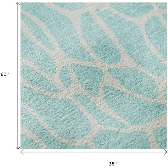 Aqua And Ivory Geometric Washable Area Rug With UV Protection Photo 9