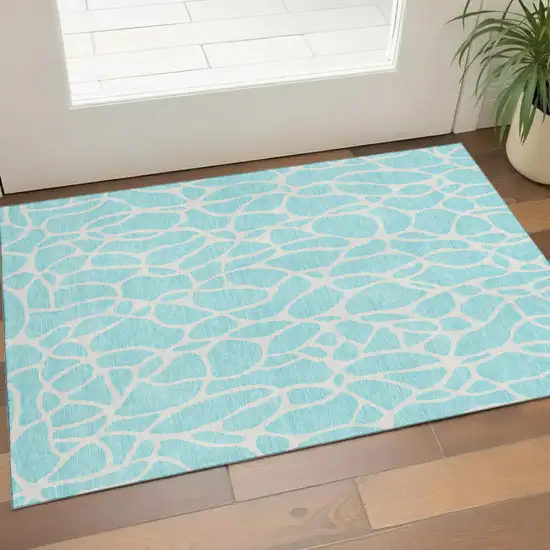 Aqua And Ivory Geometric Washable Area Rug With UV Protection Photo 1