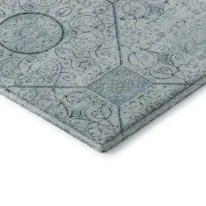 Photo of Aqua And Ivory Geometric Washable Area Rug With UV Protection