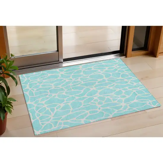 Aqua And Ivory Geometric Washable Indoor Outdoor Area Rug Photo 1