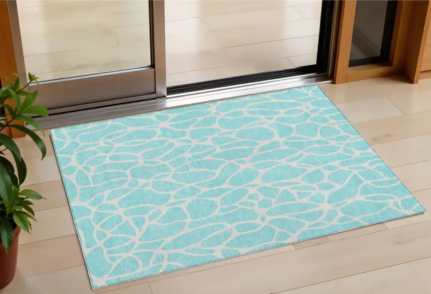 Aqua And Ivory Geometric Washable Indoor Outdoor Area Rug Photo 1