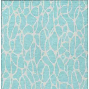 Photo of Aqua And Ivory Geometric Washable Indoor Outdoor Area Rug