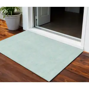 Photo of Aqua And Ivory Geometric Washable Indoor Outdoor Area Rug