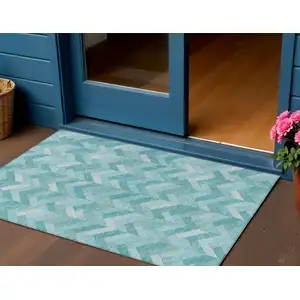Photo of Aqua And Ivory Geometric Washable Indoor Outdoor Area Rug