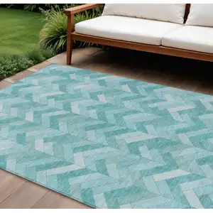 Photo of Aqua And Ivory Geometric Washable Indoor Outdoor Area Rug