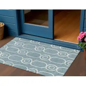 Photo of Aqua And Ivory Geometric Washable Indoor Outdoor Area Rug