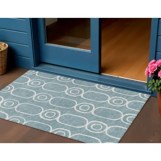 Aqua And Ivory Geometric Washable Indoor Outdoor Area Rug Photo 1