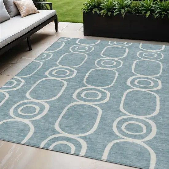 Aqua And Ivory Geometric Washable Indoor Outdoor Area Rug Photo 1