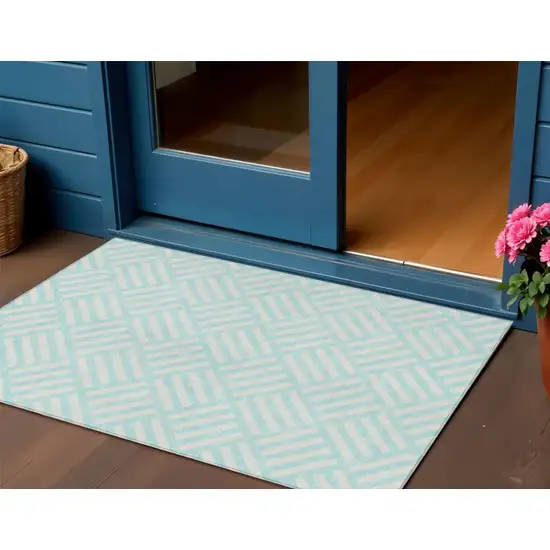 Aqua And Ivory Geometric Washable Indoor Outdoor Area Rug Photo 1