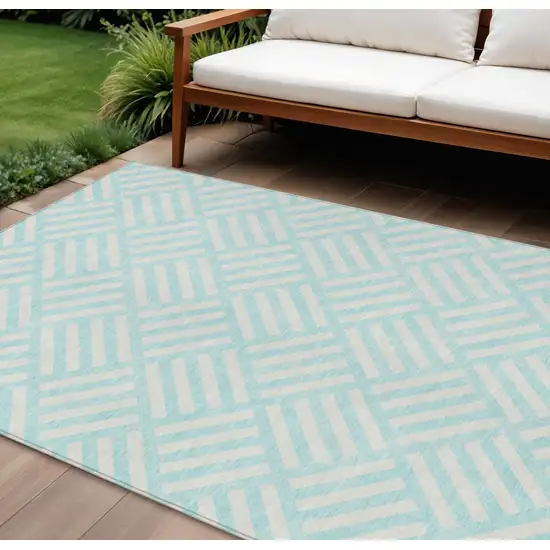Aqua And Ivory Geometric Washable Indoor Outdoor Area Rug Photo 1