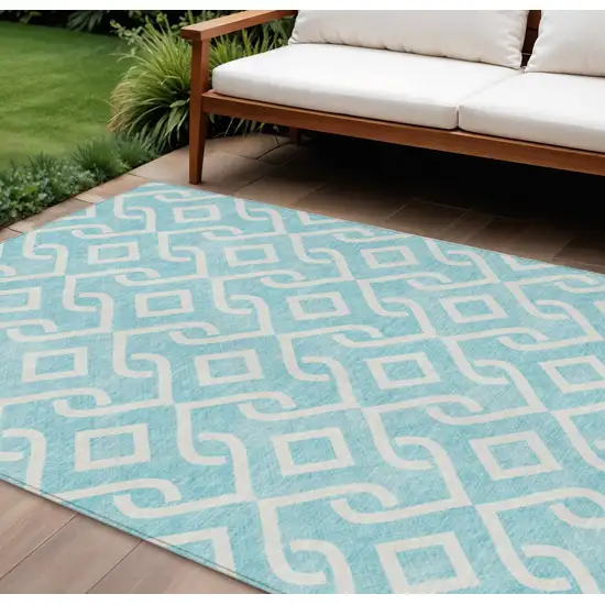 Aqua And Ivory Geometric Washable Indoor Outdoor Area Rug Photo 1