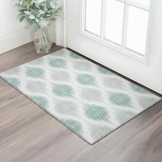 Aqua And Ivory Ikat Washable Area Rug With UV Protection Photo 2