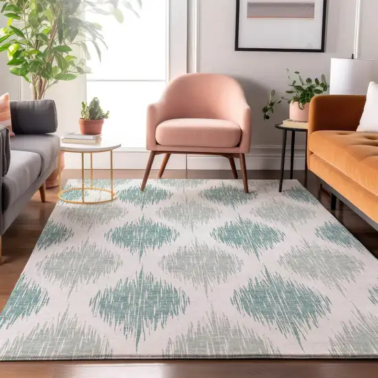 Aqua And Ivory Ikat Washable Area Rug With UV Protection Photo 5