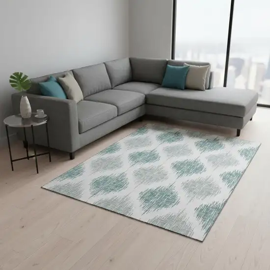 Aqua And Ivory Ikat Washable Area Rug With UV Protection Photo 2