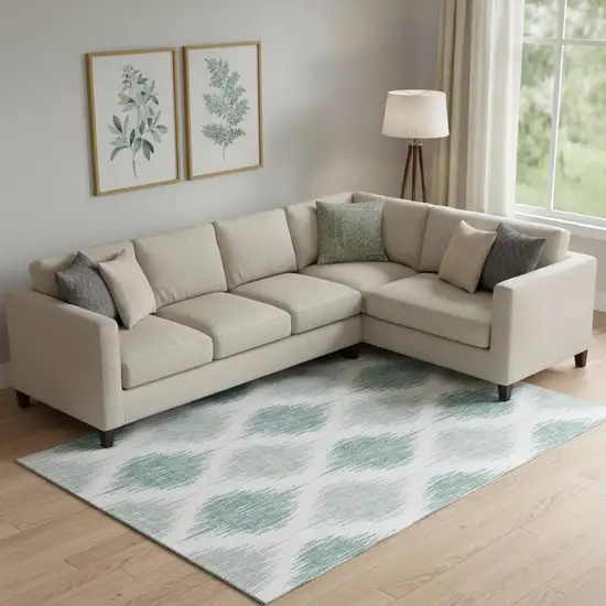 Aqua And Ivory Ikat Washable Area Rug With UV Protection Photo 1