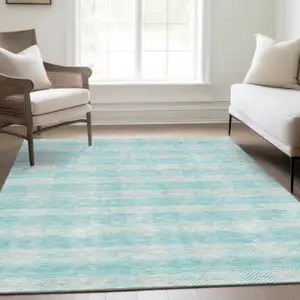 Photo of Aqua And Ivory Plaid Washable Area Rug With UV Protection