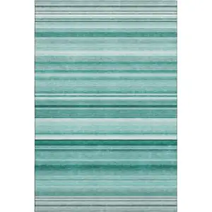 Photo of Aqua And Ivory Striped Washable Area Rug With UV Protection