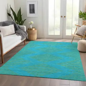 Photo of Aqua And Lime Green Geometric Washable Area Rug With UV Protection