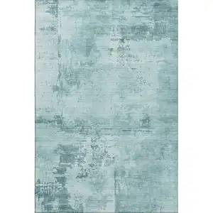 Photo of Aqua And Sky Blue Abstract Washable Area Rug With UV Protection