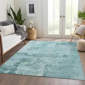 Photo of Aqua And Sky Blue Abstract Washable Area Rug With UV Protection