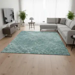 Photo of Aqua And Teal Abstract Washable Area Rug With UV Protection