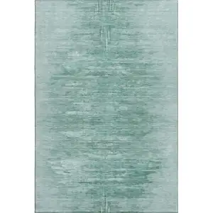 Photo of Aqua And Teal Abstract Washable Area Rug With UV Protection