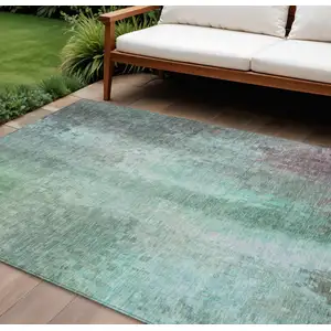 Photo of Aqua And Teal Blue Abstract Washable Indoor Outdoor Area Rug