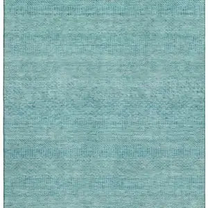 Photo of Aqua And Teal Striped Washable Area Rug With UV Protection