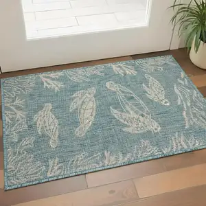 Photo of Aqua And White Animal Print Area Rug