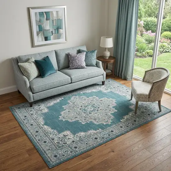 Aqua Floral Power Loom Distressed Area Rug Photo 1