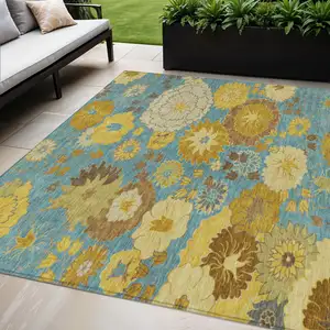 Photo of Aqua Gold And Beige Floral Washable Indoor Outdoor Area Rug