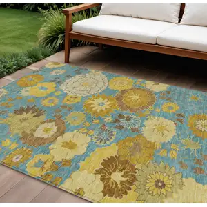 Photo of Aqua Gold And Beige Floral Washable Indoor Outdoor Area Rug