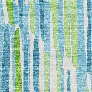 Photo of Aqua Green And Ivory Abstract Washable Area Rug With UV Protection