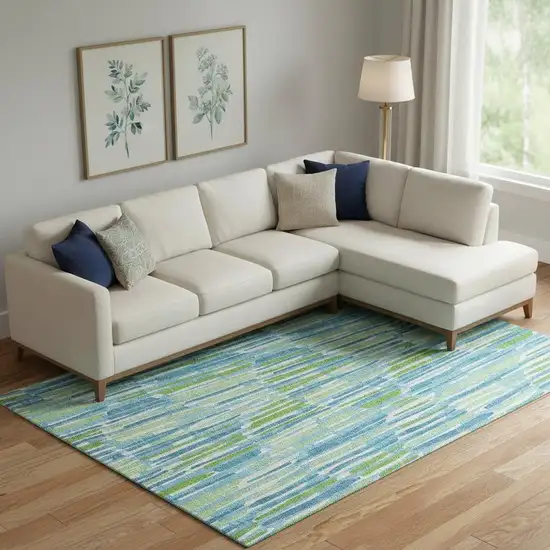 Aqua Green And Ivory Abstract Washable Area Rug With UV Protection Photo 1