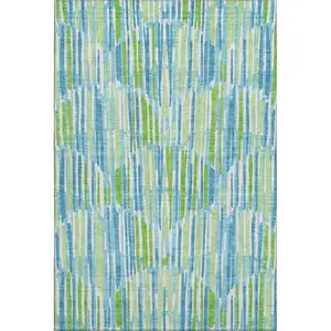 Photo of Aqua Green And Ivory Abstract Washable Area Rug With UV Protection