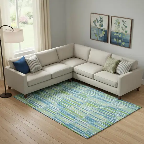 Aqua Green And Ivory Abstract Washable Area Rug With UV Protection Photo 1