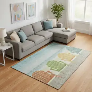Photo of Aqua Green And Orange Nautical Washable Area Rug With UV Protection