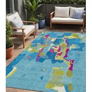 Photo of Aqua Green And Pink Abstract Washable Indoor Outdoor Area Rug