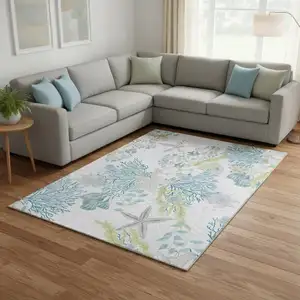 Photo of Aqua Ivory And Green Geometric Washable Area Rug With UV Protection